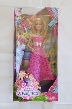 the barbie doll is wearing a pink and purple dress