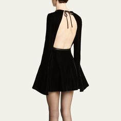 Saint Laurent velvet dress Jewel neckline; self-tie open back Long flare sleeves Mini length A-line silhouette Viscose/silk Made in Italy Saint Laurent Aesthetic, Skater Mini Dress, Velvet Mini Dress, Flare Sleeves, Fashion Mood Board, Mini Skater Dress, Jewel Neckline, Mini Velvet Dress, Velvet Dress