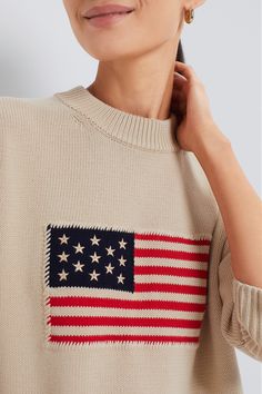 A closet essential, the Cropped Americana Sweater evokes a nostalgic feeling while featuring modern design details for an updated take on the classic staple piece. This season-less, 100% cotton pullover will take you from backyard bonfires to apple picking with its boxy fit and intarsia flag front and center.Our Favorite Details: Cropped, boxy fit American flag detail Drop-seam shoulder detail Material: 100% CottonCare: Hand wash separately in cold water with mild detergent. Reshape and lay flat Long Sleeve Jumper, Apple Picking, Ralph Lauren Collection, Cotton Pullover, Short Shirts, Staple Pieces, T-shirt Polos, Long Sleeve Pullover, Shirt Outfit