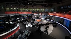 an overhead view of a television studio at night