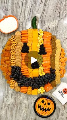 a pumpkin made out of crackers and vegetables