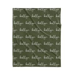 a green blanket with the words hello written in white on it's front and back