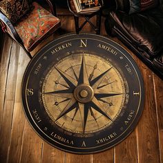 a large compass on the floor in a living room