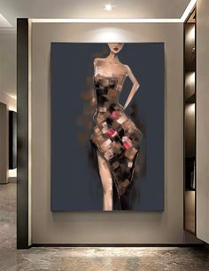 an abstract painting of a woman's dress on display in front of a wall