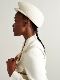 Gigi Burris' collections honor traditional hatting craft and styles, but with a modern twist. Modeled after newsboys, this 'Laurel' cap is made from soft wool-felt and has a chic minimal shape you can wear facing front and backwards. Luxury Cream Classic Felt Hat, Luxury White Modern Hats, Luxury Classic Beige Felt Hat, Luxury White Wool Hat, Luxury Cream Wool Hat, Lipstick Bag, Chain Strap Bag, Beauty Sets, Coily Hair