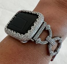 "Fits Apple Watch in sizes 38mm 40mm 42mm 41mm 44mm & 45mm Series 1-7 SE. This is a custom Iwatch Candy Apple Watch Band in Silver set with Pave Swarovski Crystal in a luxury Alloy Metal. The sparkle on this band is amazing. This band has a fold over jewelry style closure. Can be adjusted to fit wrist sizes from 6.35\" to 8.5\". Please measure your wrist before purchasing as we do not sell extra links and this band cannot be made any shorter than stated. Easy to resize and comes without needing Ceramic Watch, Apple Watch Case, Jewelry Style, Candy Apple, Bezel Diamond, Apple Watch Band, Micro Pave, Lab Diamonds, Apple Watch Bands