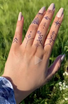 a woman's hand with tattoos on it and the words, i love you