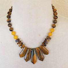 - New & Handmade Materials: Tiger's Eye, Golden Jade, Goallic Spacer Beads, Gold Plated Lobster Clasp And Extender Chain - Length: Necklace: 18 3/8" From End To End, 2" Extender Chain - Longest Pendant Point: 1 3/4" L X 3/4" Boho Necklace Autumn Necklace Lucky Brand Necklace, Paper Beads Necklace, Fan Jewelry, Autumn Necklace, Long Pearl Necklaces, Bubble Necklaces, Statement Bib Necklace, Yellow Gemstones, Wood Bead Necklace