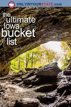 the ultimate iowa bucket list is in front of a cave with trees and rocks on it