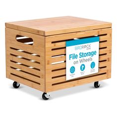 a wooden crate sitting on wheels with a sign that reads file storage on wheels