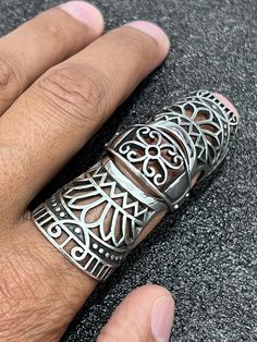 When you have to shine, this eye catching statement piece will speak volumes about you and your unique style. Elegant, trendy, and fashionable; get yours today! Full Finger Ring Metal: Stainless Steel Finish: Polished What are the pros of stainless steel rings? Stainless steel is durable - You can wear it every day and keep doing all your normal and heavy duty tasks without worrying about damaging the ring. A stainless steel ring will take all the onus and wear & tear of daily use. Ages well - Stainless steel would be resistive to scratches, corrosion, heat and general signs of aging. The material will not show usual signs of wear and tear and you don't need much maintenance to attain that either. You can just clean the ring once a day or a few times in a week. The material doesn't get dam Index Ring, Full Finger Ring, Full Finger Rings, Stainless Steel Ring, Mens Trends, Aging Well, Ring Metal, Finger Ring, Stainless Steel Rings