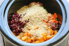 rice, beans and carrots are mixed together in the slow cooker to make this meal