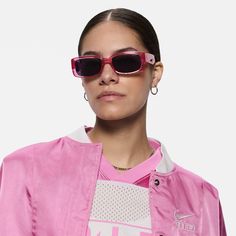 Meet the Nike Variant I. Made with mismatched details and a chunky, rectangular frame, these shades perfectly combine your sporty attitude and bold, streetwear aesthetic. Bonus: they’re made from at least 20% recycled content by weight. Pink Anti-reflective Sports Sunglasses, Casual Sunglasses With Gradient Lenses For Streetwear, Mirrored Sunglasses For Streetwear, Casual Sunglasses With Uv Protection For Streetwear, Modern Pink Sunglasses For Outdoor, Casual Red Rectangular Sunglasses, Trendy Anti-reflective Sunglasses For Streetwear, Spring Uv Protection Sunglasses For Streetwear, Casual Tinted Sunglasses For Streetwear