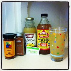 an assortment of condiments on a counter top