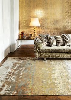 a living room filled with furniture and a rug