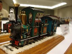 a toy train is on display in a room