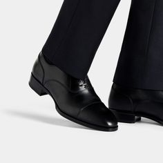 A classic pairing to formal suits, these timeless black Oxfords are crafted in Italy from supple Italian calf leather in a Blake stitch, and feature full leather lining and sole. Fitted Black Leather Shoes For Semi-formal Occasions, Black Cap Toe Semi-formal Loafers, Black Moc Toe Oxfords For Semi-formal Occasions, Timeless Wingtip Oxfords For Formal Occasions, Timeless Formal Wingtip Oxfords, Classic Oxfords With Calf Leather And Leather Sole, Timeless Oxfords In Calf Leather With Almond Toe, Timeless Oxfords With Almond Toe In Calf Leather, Black Calf Leather Dress Shoes With Brogue Detailing