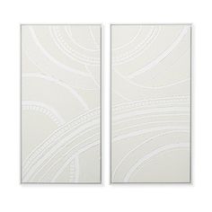 two white abstract paintings on the wall