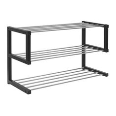 two black and white shelves with metal bars