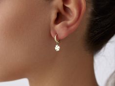 🌟 14K Gold Clover Dangle Hoop Earrings 🌟 Embrace good fortune and timeless elegance with our 14K Gold Clover Dangle Hoop Earrings. These stunning hoops feature delicate four-leaf clover charms, symbolizing luck, hope, and prosperity, dangling gracefully from classic hoops. Whether you're dressing up for a special occasion or adding a charming touch to your daily look, these earrings are designed to bring a little extra luck and style into your life. 🍀✨ Available in three gorgeous colors--clas Gold Earrings For Women, Clover Charm, Dangle Hoop Earrings, Stunning Earrings, Leaf Clover, Gold Hoops, Earrings For Women, Jewelry Earrings Dangle, Timeless Elegance