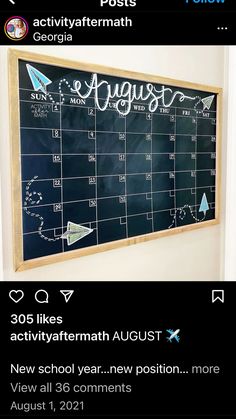 a blackboard with the word august written on it and an image of a calendar