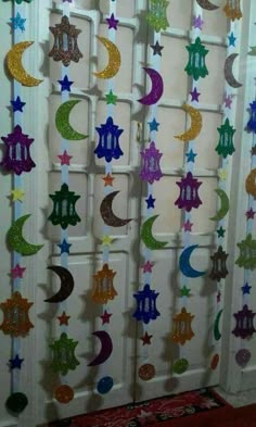 the door is decorated with stars and crescents