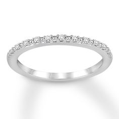 a white gold wedding band with diamonds