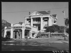 an old black and white photo of a building