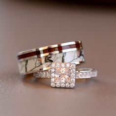 two wedding rings with different designs on them