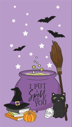 a witch's caulder with a black cat sitting next to it