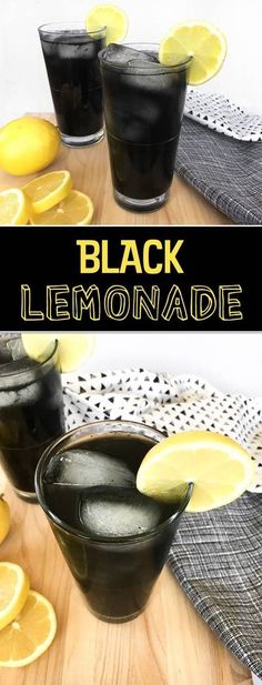 two glasses filled with black lemonade sitting on top of a wooden table next to sliced lemons