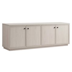 a white cabinet with three doors and two drawers on the bottom, in front of a white background