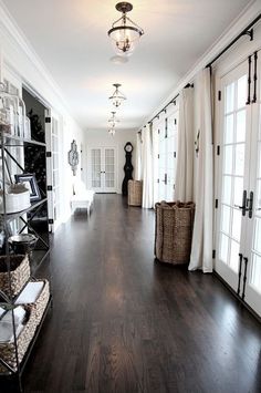 an image of a room with wood floors