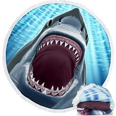 a large shark with its mouth open in the middle of an ocean scene round beach towel