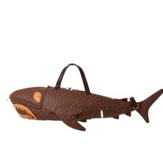 a brown bag with a shark on it