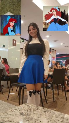 a woman in a blue skirt and white shirt posing for the camera