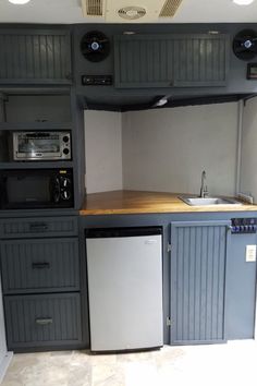 Kitchen in a cargo trailer camper v nose Ice Shack Interior, Enclosed Trailer Cabinets, Trailer Cabinets, Converted Cargo Trailer, Cargo Camper