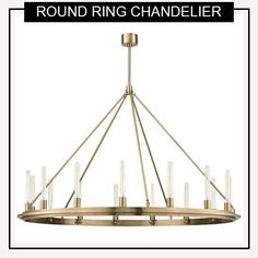 the round ring chandelier is made from brass and features clear glass tubes on each end