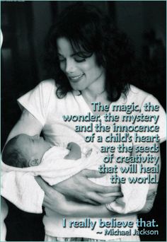 a woman holding a baby in her arms with a quote from michael jackson on it