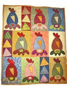 a quilted wall hanging with many different animals on it