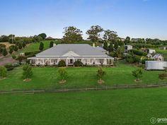 an aerial view of a house in the country