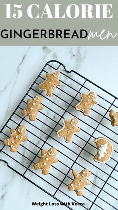 some cookies are on a cooling rack with icing