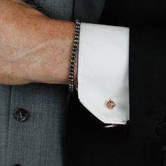 These Rose cufflinks are simple, stylish and timeless.  Inspired by their ancient symbolism of love, beauty and passion. They feature an intricately hand-carved rose, which has a chain link to a sleek lozenge shape the other side -  the perfect accessory for weddings, anniversaries or any occasion for the sartorial gent.100% handmade in Hatton Garden, London from recycled silver, which is then heavily overlaid with 18ct yellow gold vermeil.  Come beautifully packaged in a Lee Renée branded box. Rose Gold Cufflinks, Wedding Cufflinks Groom, Floral Wedding Bands, Cufflinks Gold, Gift For Groom, Diamond Cufflink, Groom Cufflinks, Wedding Cufflinks, Rose Gold Plated Ring