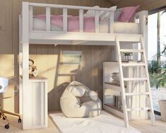 The image shows a loft bed with a desk and shelves. The bed is elevated off the ground and has a ladder leading up to it. The desk is compact and has a chair in front of it. There are books and other items on the shelves and desk. The color of the loft bed is white. The bed sheets are girly and pink. The bed is a girls bed. The background is on a beach. The time of day is sunset. Twin Loft Bed Diy, Under Loft Bed Ideas, Loft Bed Diy Plans, Loft Bed Diy, Loft Beds For Small Rooms, Diy Loft, Colorful Bedroom Decor, Beds For Small Rooms, Diy Loft Bed