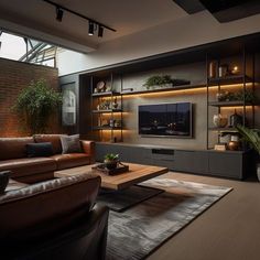 a living room with couches, tables and a television on a wall in the center