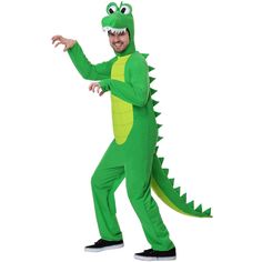 a man in a green dinosaur costume is posing for the camera with his hands out