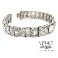 This sparkling vintage, circa 1900's, Edwardian diamond link bracelet is masterfully crafted in platinum. The bracelet contains ten large center diamonds, the center of which is an Old Mine Cut (OMC), flanked by the other nine larger Old European Cut (OEC) diamonds. The center OMC diamond is approx 1.35 carats and is an H color VS1 clarity. The two larger of the flanking diamonds are approximately 3/4 carats each, while the remaining 7 larger diamonds are approximately 1/4 carat each. Finally, e Vintage Diamond Bracelet With Hand-set Diamonds, Vintage Hand Set Diamond Bracelet, Platinum Tennis Bracelet With Diamond Accents For Wedding, Vintage Brilliant Cut Diamond Bracelet For Wedding, Vintage White Gold Diamond Bracelet With Brilliant Cut, Vintage Platinum Diamond Bracelet With Single Cut Diamonds, Vintage Platinum Bracelets With Diamond Accents, Timeless Platinum Diamond Bracelet For Wedding, Formal Art Deco Diamond Tennis Bracelet