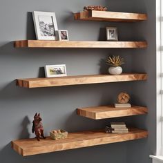 10 FAQs About Floating Shelves Q: "What makes floating wooden shelves a great addition to home decor?" A: Floating wooden shelves provide a versatile and stylish solution for home decor by offering functional storage without sacrificing aesthetics. They can showcase decor items, books, and collectibles, enhancing the overall look of any room.  Q: "How can white floating shelves contribute to a clean and stylish interior?" A: White floating shelves contribute to a clean and stylish interior by adding a sense of lightness and simplicity. They create a neutral backdrop for displaying colorful items, making the space visually appealing.  Q: "In what ways can floating bookshelves be utilized for both storage and display purposes?" A: Floating bookshelves are excellent for storage and display. T Floating Shelves For Corner Wall, Floating Shelves Different Lengths, Thick Wood Shelves Living Room, Offset Wall Shelves, Floating Wood Shelves Office, Wall Book Display Ideas, Wooden Shelves On Wall, Modern Bedroom Shelving, Wood Wall Shelf Ideas