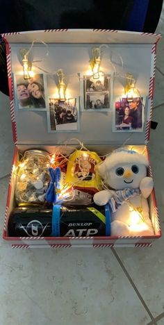 an open box filled with pictures and lights