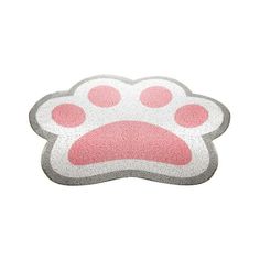 a pink and white dog paw rug on a white background